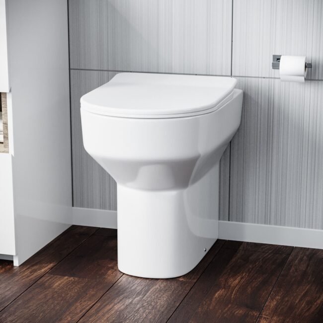 Modern White Comfort Height Back to Wall Toilet with Soft Close Seat - Image 2
