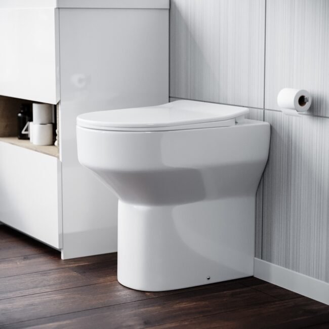 Modern White Comfort Height Back to Wall Toilet with Soft Close Seat - Image 3